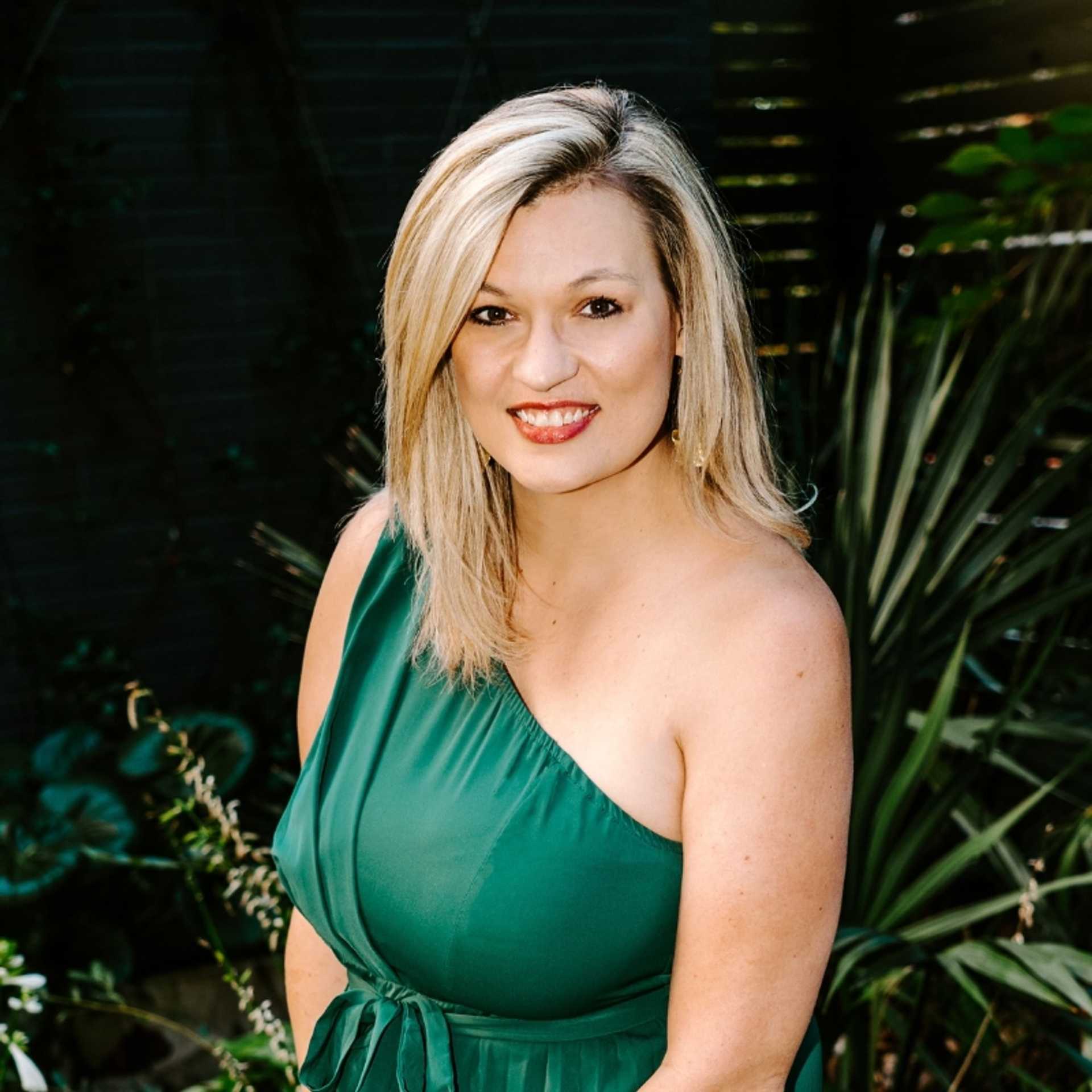 Portrait of Maria, a professional stylist at Bob Steele Salon, showcasing their expertise and style.