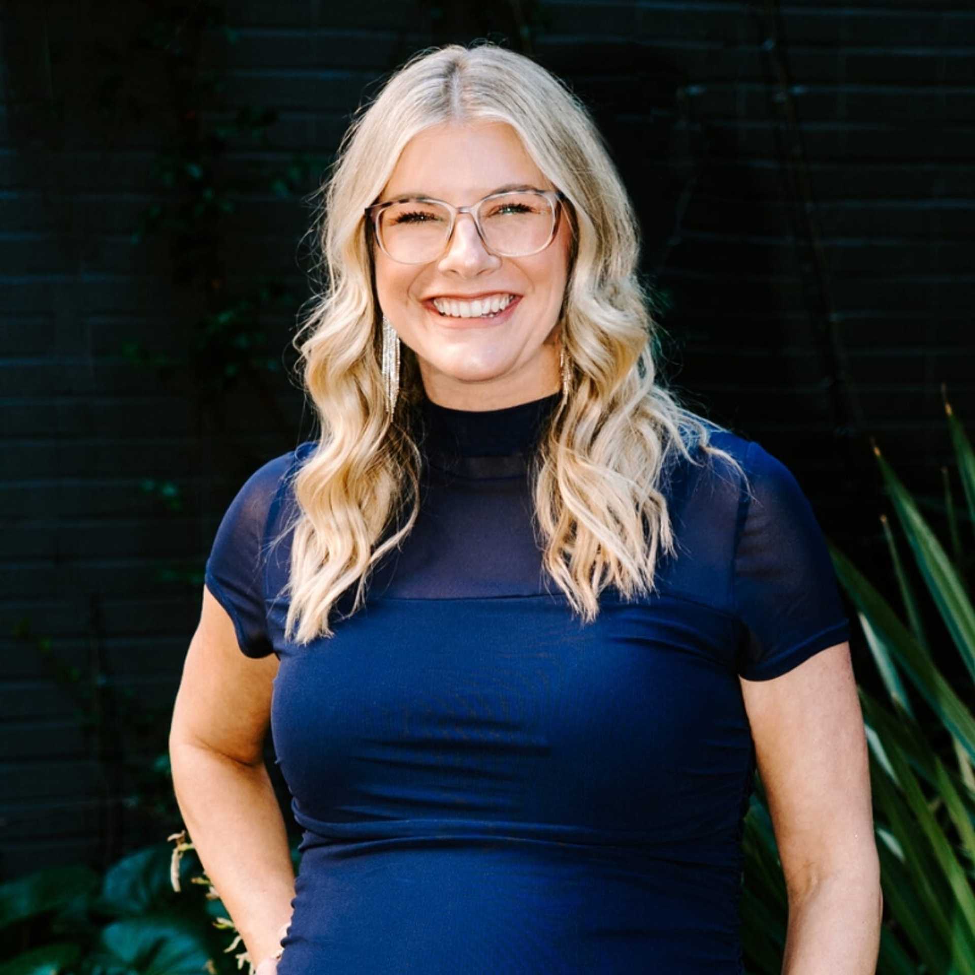 Portrait of Jennifer, a professional stylist at Bob Steele Salon, showcasing their expertise and style.