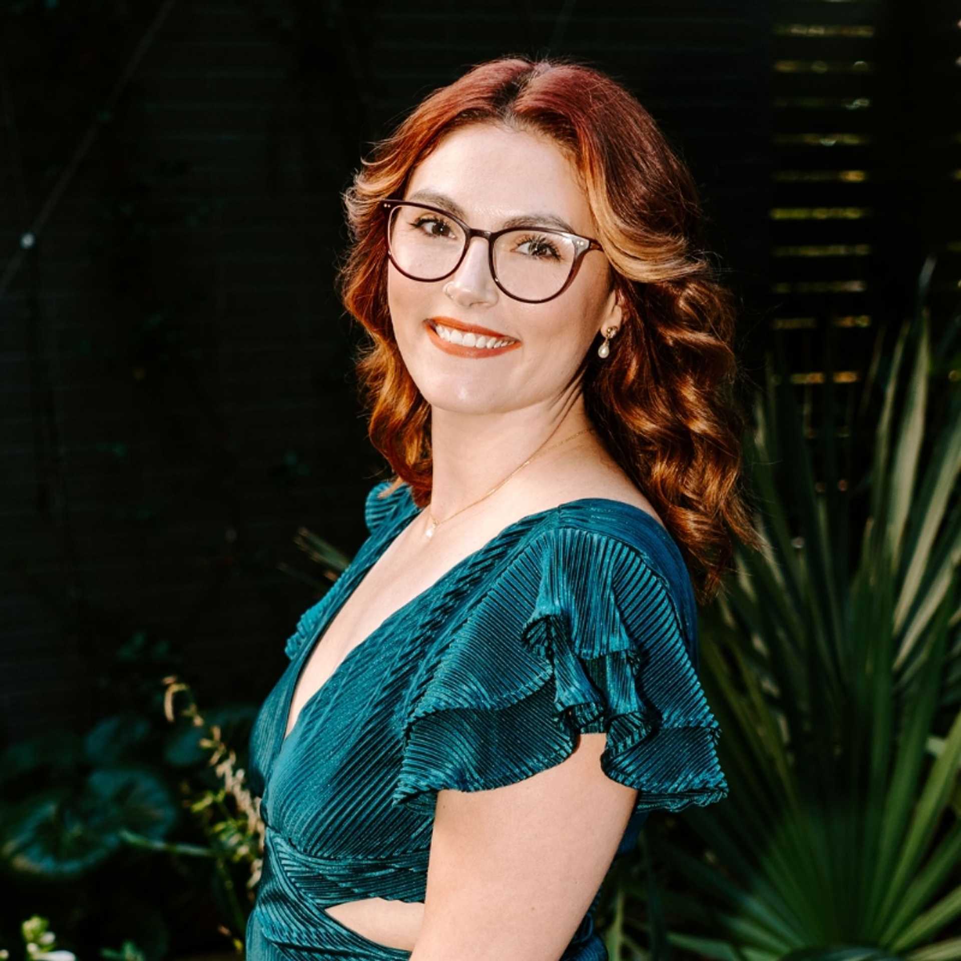 Portrait of Gabby, a professional stylist at Bob Steele Salon, showcasing their expertise and style.