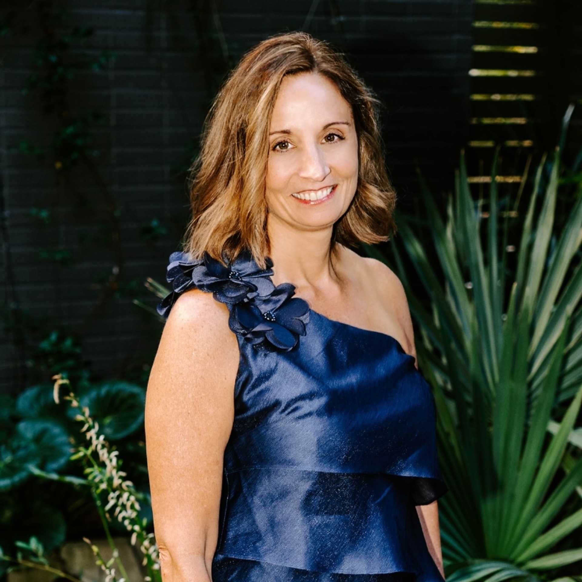 Portrait of Julia, a professional stylist at Bob Steele Salon, showcasing their expertise and style.