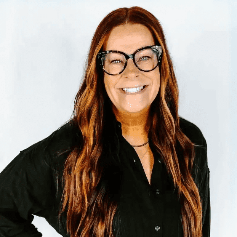 Portrait of Jean Ann, a professional stylist at Bob Steele Salon, showcasing their expertise and style.