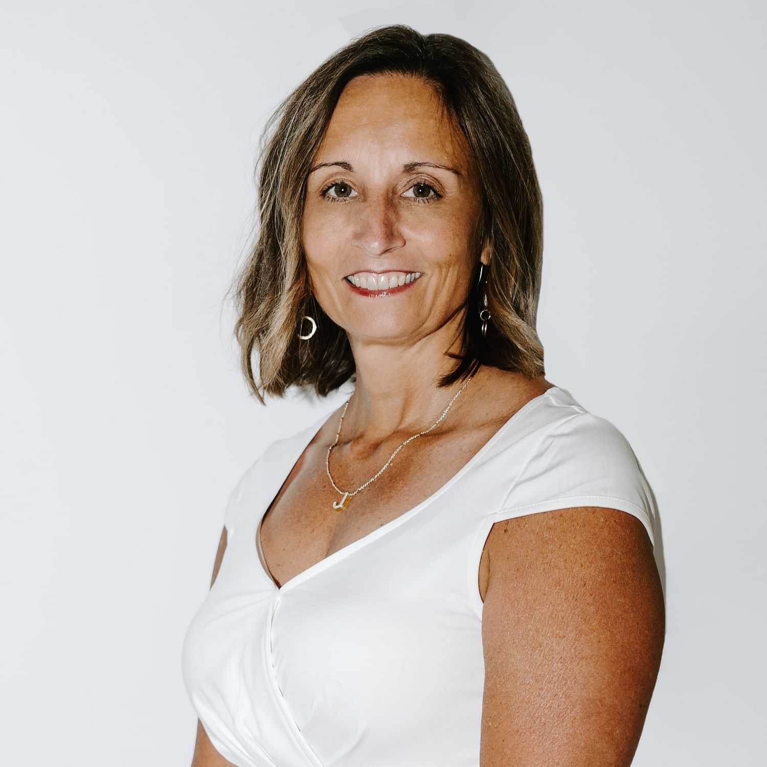 Portrait of Julia, a professional stylist at Bob Steele Salon, showcasing their expertise and style.