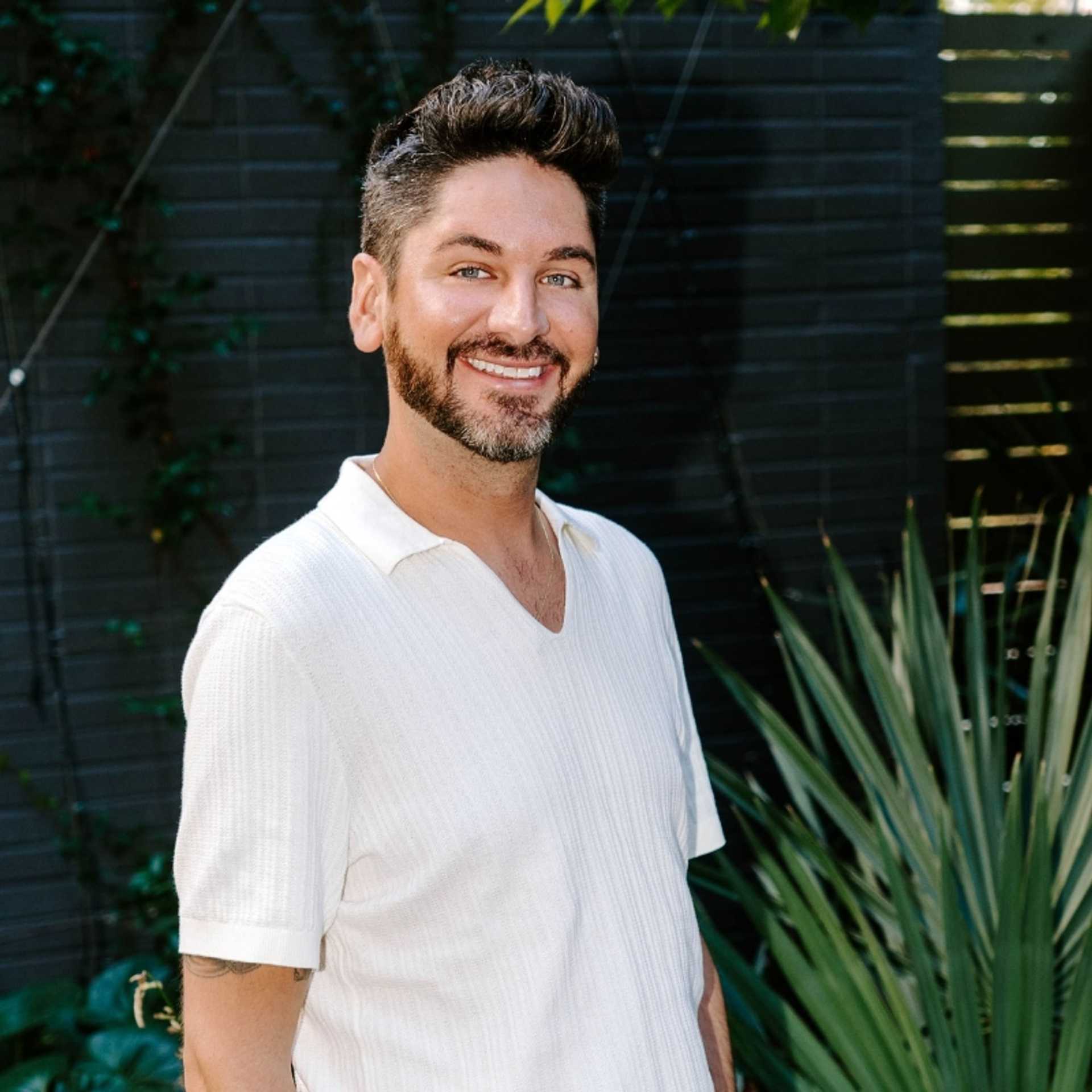 Portrait of Ricky, a professional stylist at Bob Steele Salon, showcasing their expertise and style.